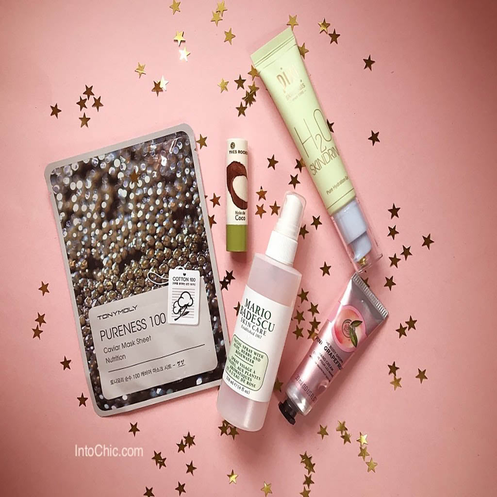 Beauty products such as tony moly caviar mask, coconut lip balm ives richer, Mario Badescu Facial rose spray, the body shop pink grape hand cream, pixie h2o skindrink face cream