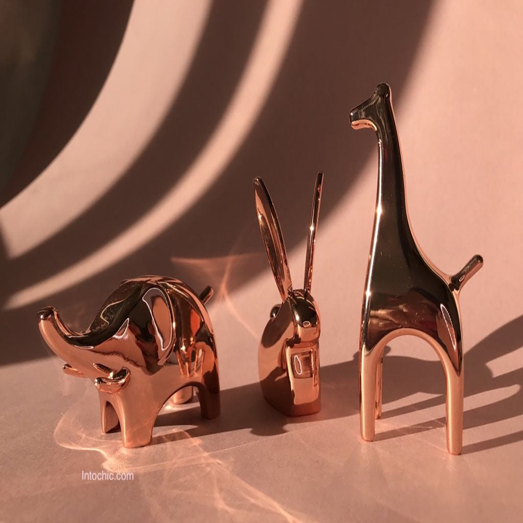 Cooper ring holders in a shape of elephant, giraffe and bunny. Desined by UMBRA